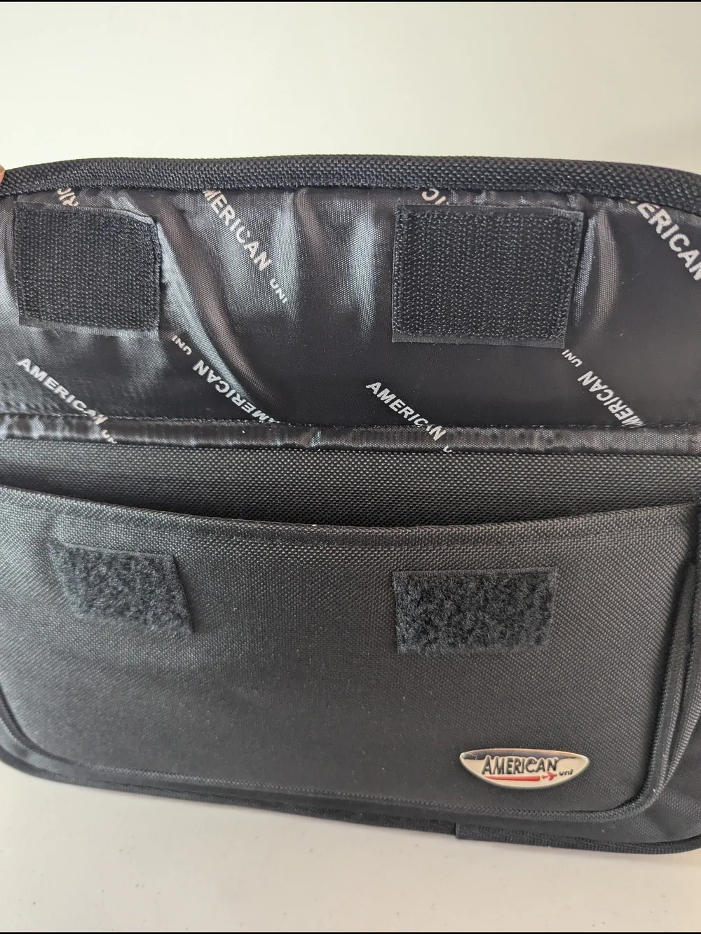 New with tags American Uni travel laptop and document organizer bag in black.